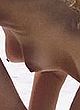 Camille Rowe naked pics - topless on the beach 