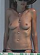 Heidi Klum naked pics - topless in hotel backyard
