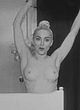 Madonna undressing & exposing her tits pics