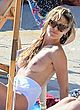 Heidi Klum naked pics - sunbathing topless on beach