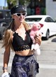 Paris Hilton flashes skin while shopping pics
