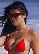 Suelyn Medeiros busty & booty in red bikini pics