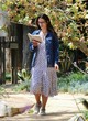 Jordana Brewster reads a book while walking pics