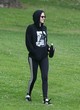 Kristen Stewart sexy in black hooded sweatsuit pics