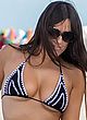 Claudia Romani shows under-boobs & bikini ass pics