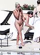 Lady Gaga topless by the hotel pool pics