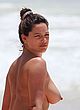 Kelly Brook topless on the beach, casual pics