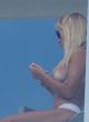 Laura Cremaschi naked pics - goes topless on a balcony
