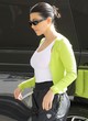 Kourtney Kardashian chic in green zip-up jumper pics
