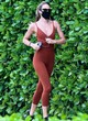 Candice Swanepoel wore tight red leggings pics