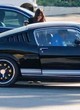 Dakota Johnson goes for a ride in her mustang pics