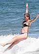 Ireland Baldwin naked pics - nip slip while surfing