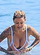 Tina Louise boob slip bikini malfunction pics