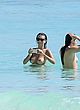 Emily Ratajkowski standing topless in water pics