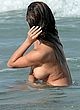 Chrissy Teigen naked pics - topless during a photo shoot