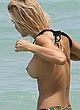 Joy Corrigan naked pics - exposing boobs on the beach