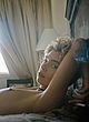 Stella Maxwell naked pics - showing small tits & smoking