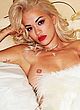 Rita Ora posing topless for magazine pics