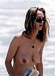 Uma Thurman naked pics - topless at the beach, sexy