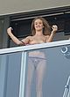 Rosie Huntington-Whiteley naked pics - shows nude tits on the balcony