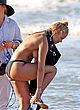 Lara Worthington caught topless during ps pics
