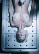 Carla Quevedo lying on table, nude boobs pics