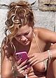 Rita Ora naked pics - oops nip-slip in beige bikini