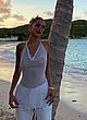 Bella Hadid posing in a white sheer top pics