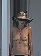 Heidi Klum naked pics - showing her flat tits outdoor
