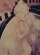 Christina Aguilera posing topless and naked pics