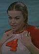 Carmen Electra showing boobs in wet t-shirt pics
