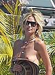 Heidi Klum walking topless in backyard pics