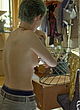 Kristen Stewart naked pics - wardrobe change, boob slip