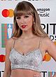 Taylor Swift busty in a crop-top and skirt pics