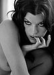 Milla Jovovich posing in lingerie & nude pics
