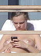 Cara Delevingne naked pics - sunbathing while on holiday