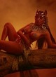 Nicki Minaj shows boobs in music video pics