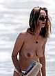 Uma Thurman showing her sexy boobs, beach pics
