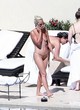 Lady Gaga sunbathing & talking on phone pics