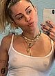 Miley Cyrus naked pics - taking selfies, almost topless