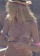 Heidi Klum nude boobs at a beach in italy pics