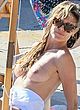 Heidi Klum naked pics - caught topless in capri, sexy