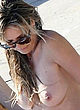 Heidi Klum naked pics - topless on the beach in italy