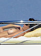 Cindy Crawford nude tits, sunbathing on boat pics