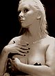 Christina Aguilera almost topless at her music ps pics