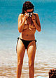 Penelope Cruz standing topless on the beach pics