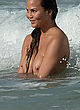 Chrissy Teigen nude tits, beach photoshoot pics