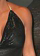 Kim Kardashian see-through to tits in black pics