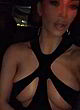 Kim Kardashian amost topless, revealing dress pics