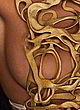 Tinashe nip slip in gold top pics